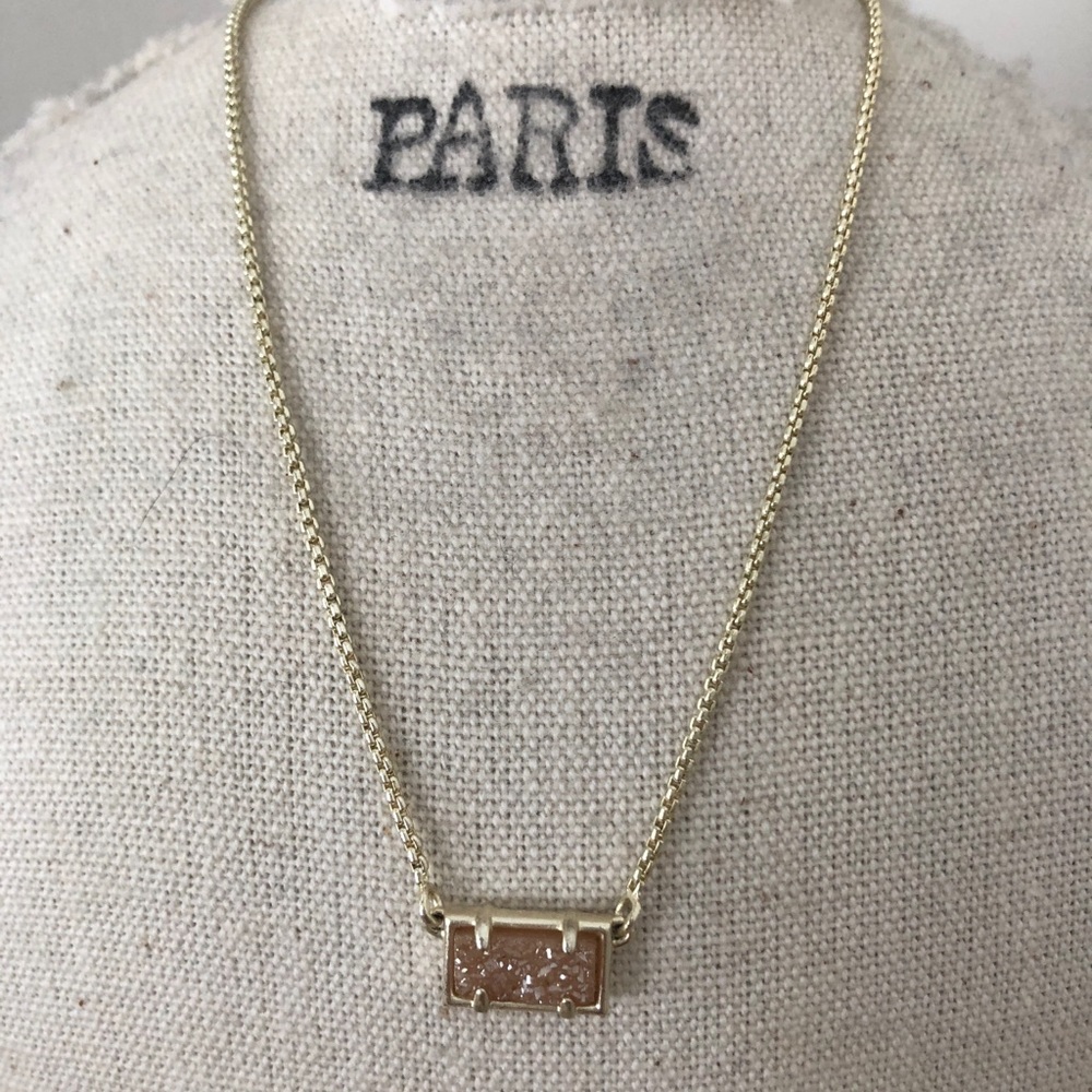 Kendra Scott necklace with blush sparkly stone